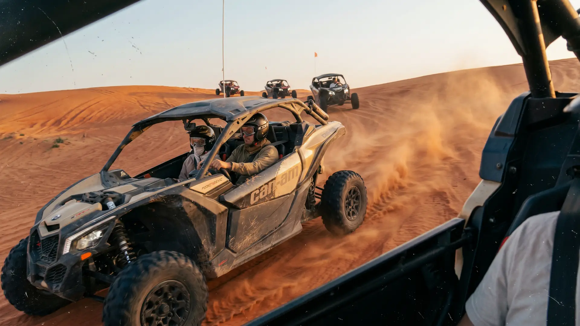Can-Am X3 RS Turbo RR four-seater buggy on a Dubai dune crest