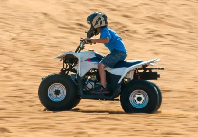 Yamaha 90cc kids quad bike on the supervised track in the Dubai desert
